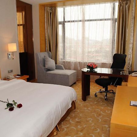 Shanghai Sky Rainbow Hotel Habitación foto
